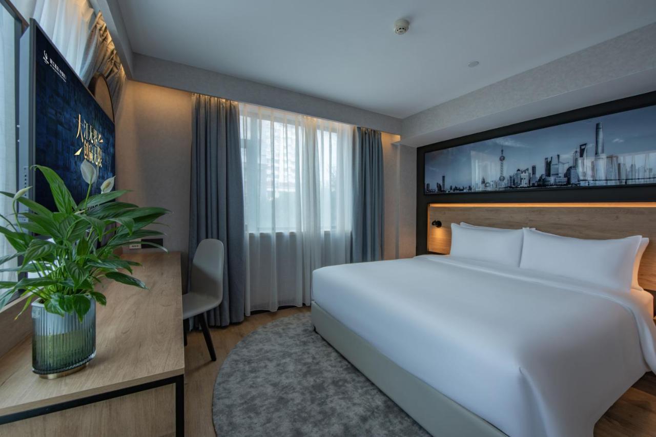 Park Inn By Radisson Shanghai Huanqiugang Zewnętrze zdjęcie