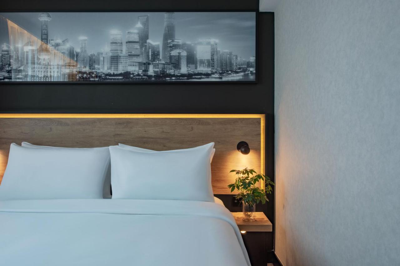 Park Inn By Radisson Shanghai Huanqiugang Zewnętrze zdjęcie