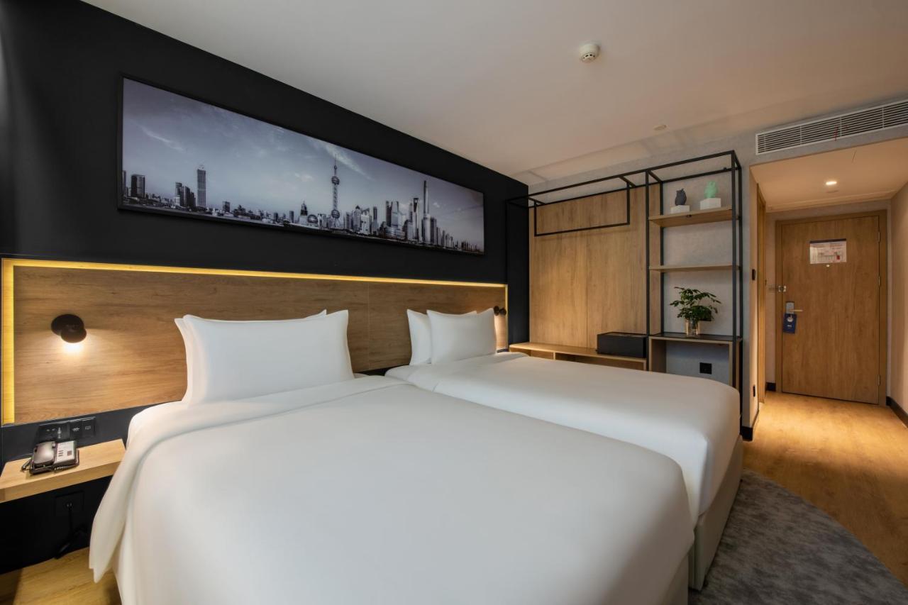 Park Inn By Radisson Shanghai Huanqiugang Zewnętrze zdjęcie