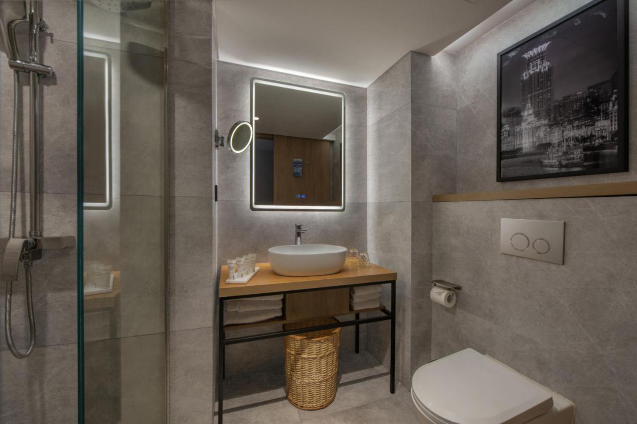 Park Inn By Radisson Shanghai Huanqiugang Zewnętrze zdjęcie